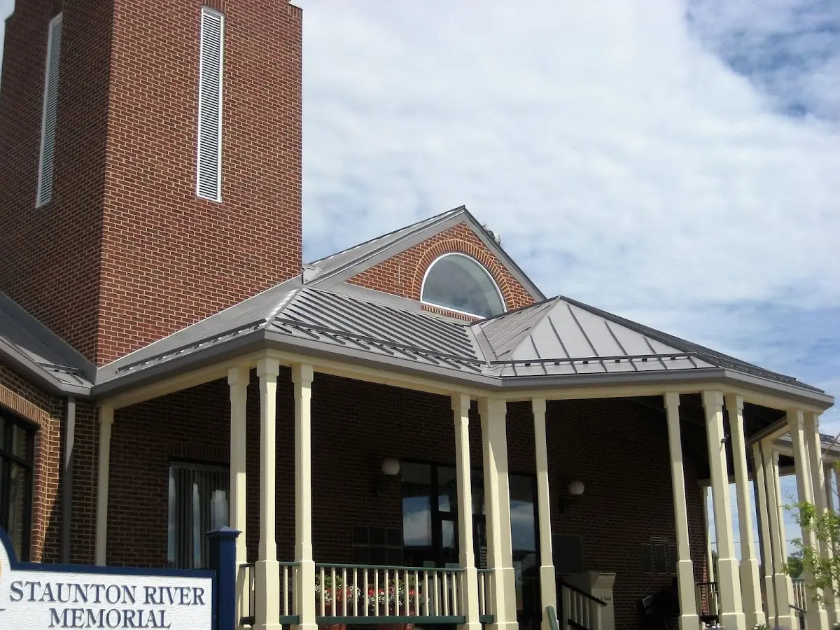 Skilled roofing craftsmen working on a residential roof in Saint Marys Seminary